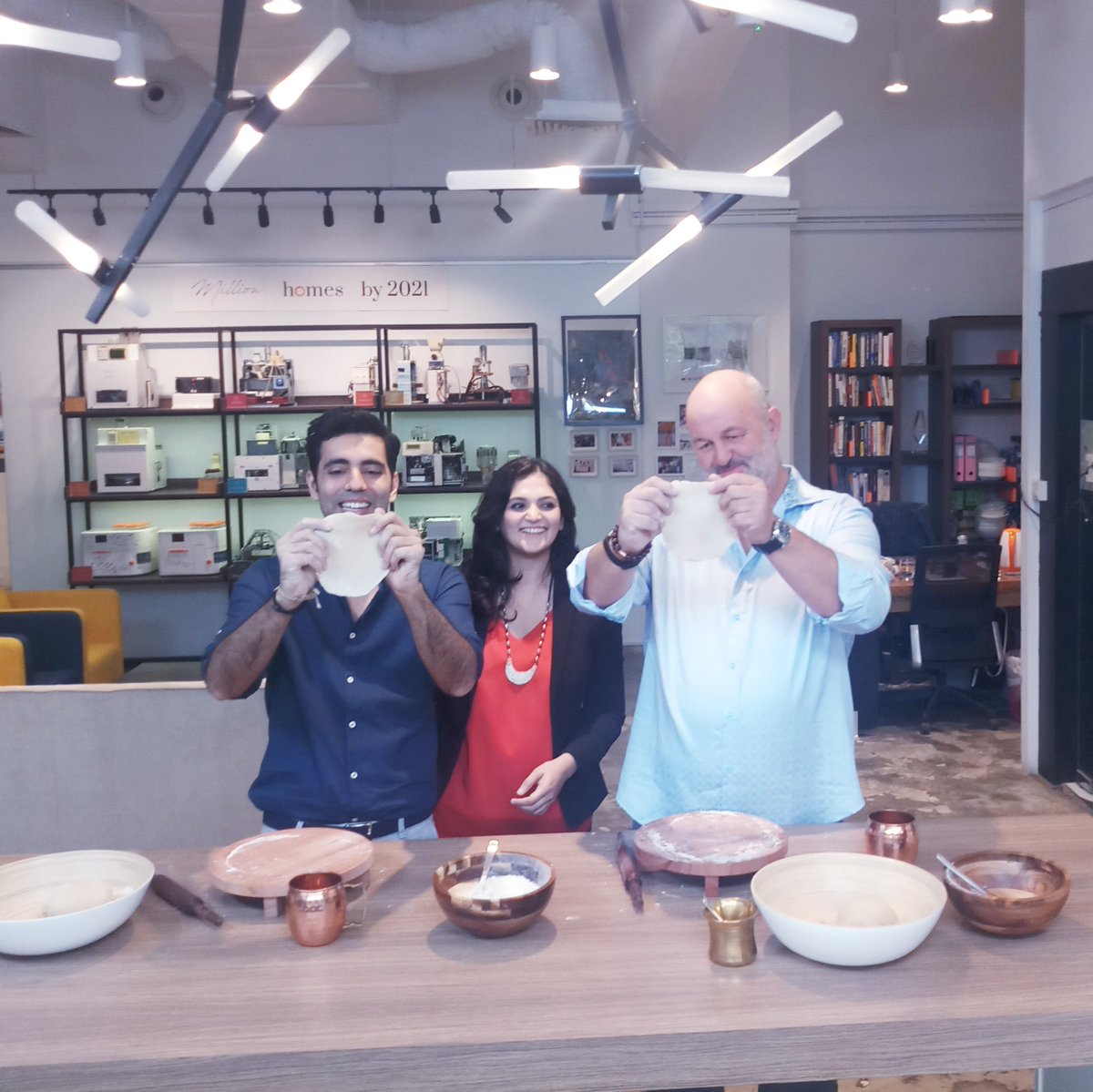 rotimatic's tweet photo. @Werner, CTO of https://t.co/m9xehL56m8 dropped by the @Rotimatic office today! @rishikum &amp; @PranotiNagarkar challenged him to a roti cook-off, a fun exercise for someone new to the pains of traditional roti-making. @Werner really gets it now! https://t.co/y4pQ3UqVKT