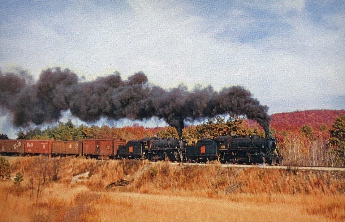 americanrails's tweet image. A pair of Central Vermont 2-8-0's, #465 and #470 steam through New England's fall colors with a southbound freight train at Millers Falls, Massachusetts during October of 1956. David Bartlett photo.