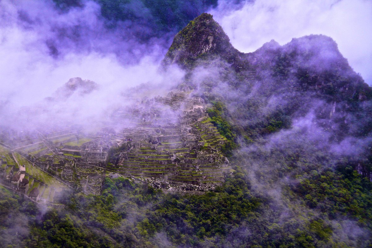 Seeing #MachuPicchu uncover from the fog is an unforgettable experience! #Cusco #Peru #traveltips #inca