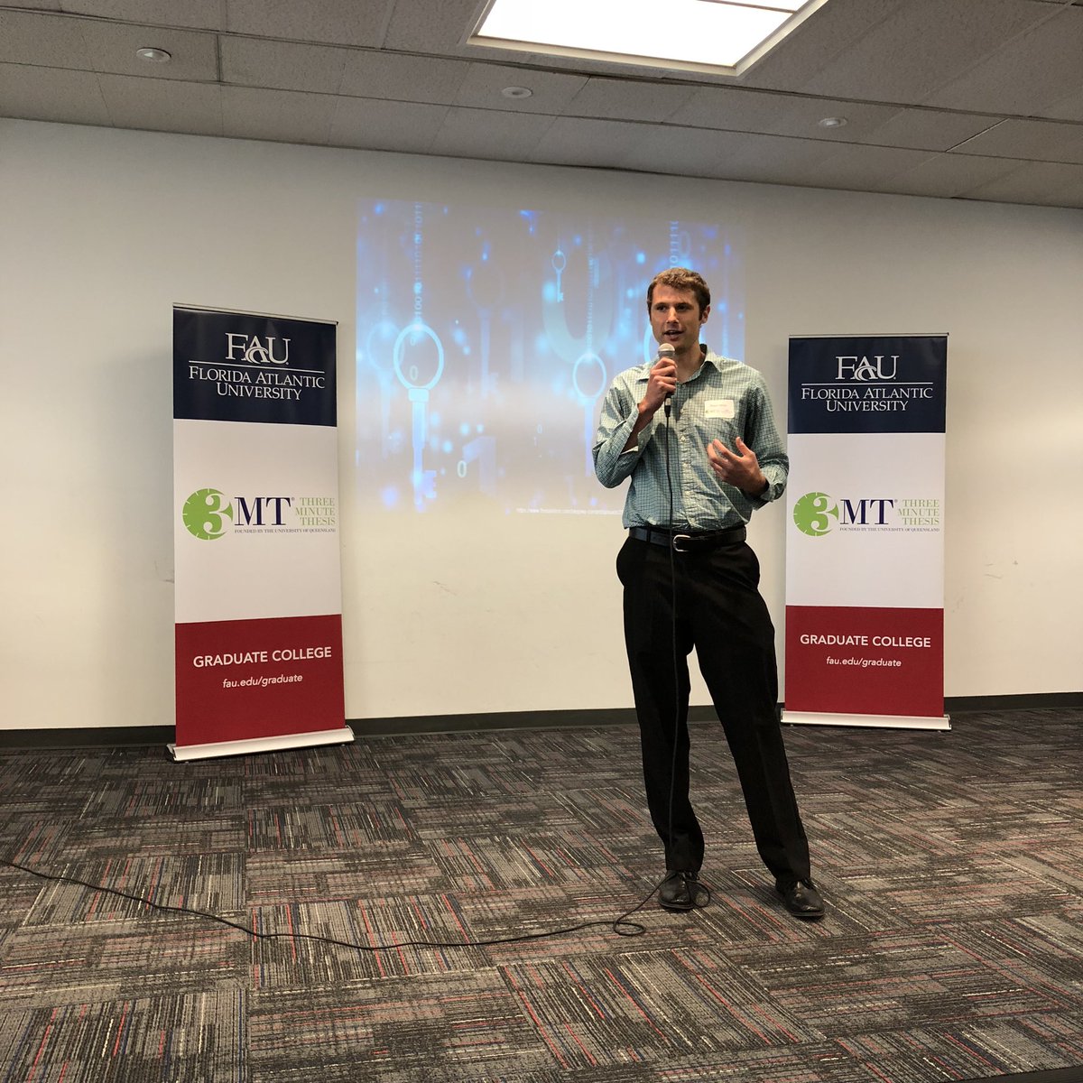3MT_FAU's tweet image. Shaun Miller, Mathematics student, presenting his Three Minute Thesis: “Security in a Post-Quantum World” #security #quantummathematics #FAU3MT