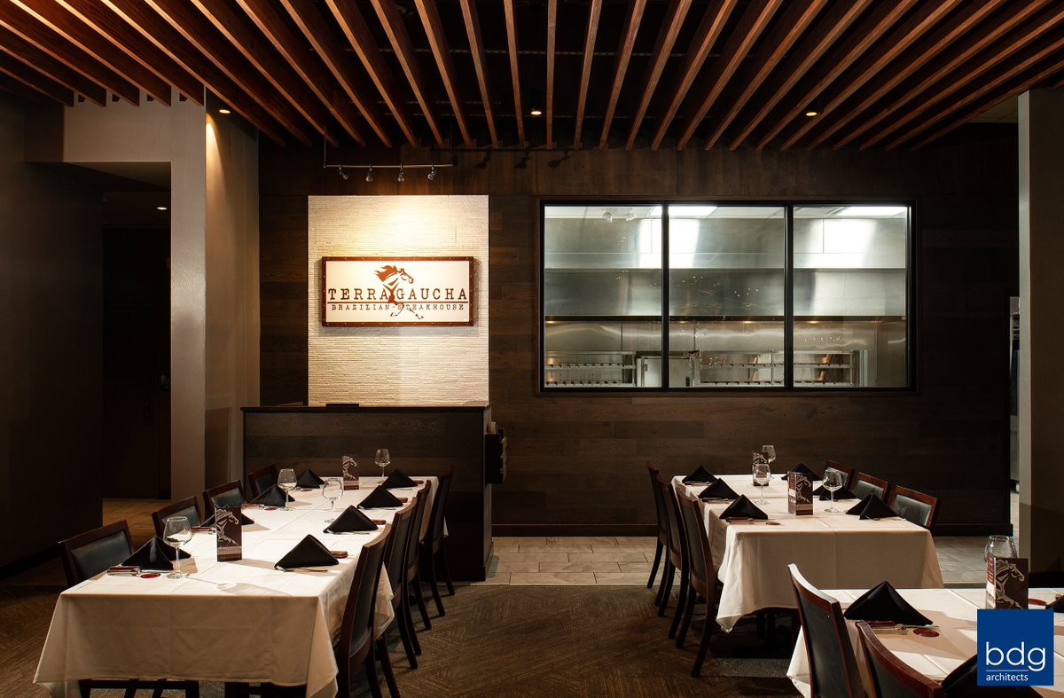 BDG Architects worked with Terra Gaucha Brazilian Steakhouse to convert an existing restaurant space to support freestanding tables that allow for their rodizio-style dining experience. Visit here for more info &amp; photos: bdgllp.com/portfolio/terr…