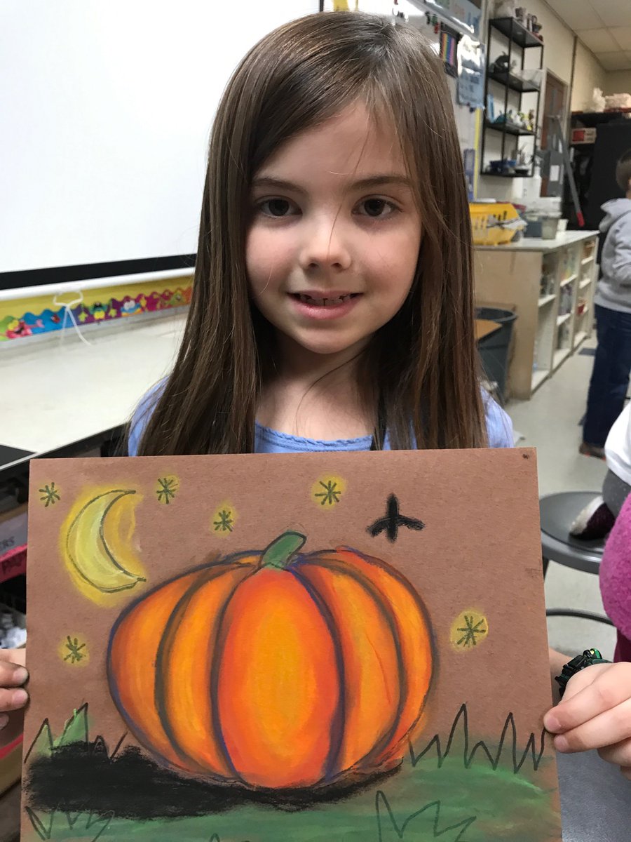 “I used orange, light yellow, red, light green and a dark green chalk pastel. I made a pumpkin.”