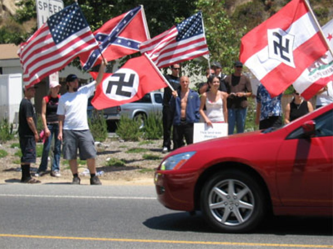 53) But the movement also clearly activated a strand of white supremacist activism that had not made itself public for many years. This was taken at a California anti-immigrant rally in 2006.