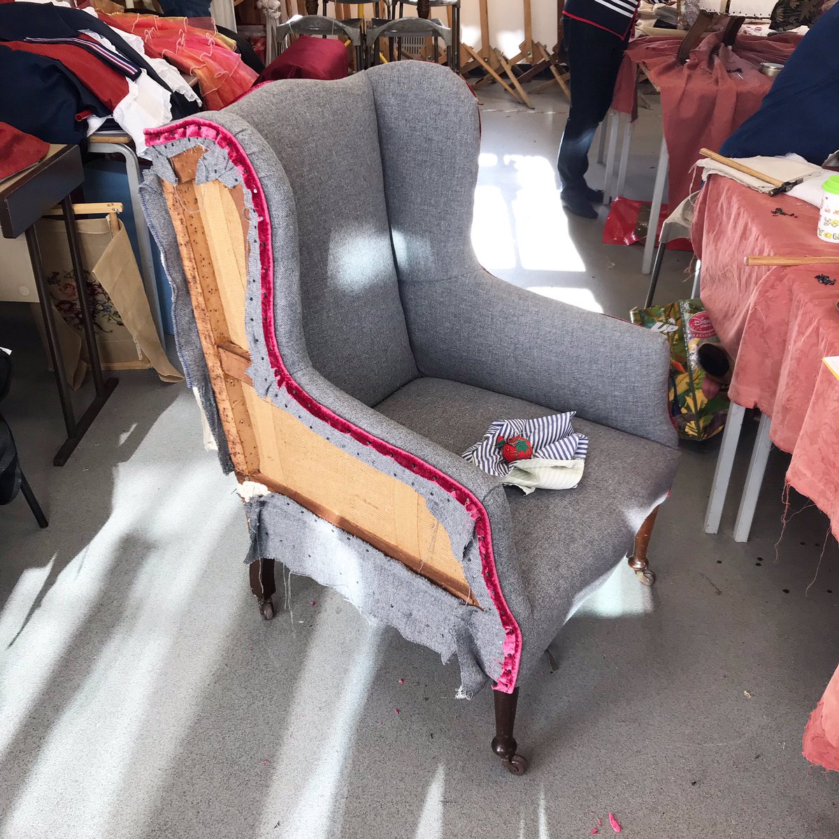 It’s a beautiful Halloween day and what better way to spend it than a spot of upholstery! We’re following the natural curves on this grand old wingback. Piping tacked on, we’re ready to begin on the outside wing and arm sections #upholstery #myvintagehome #handmade @UpcycledHour