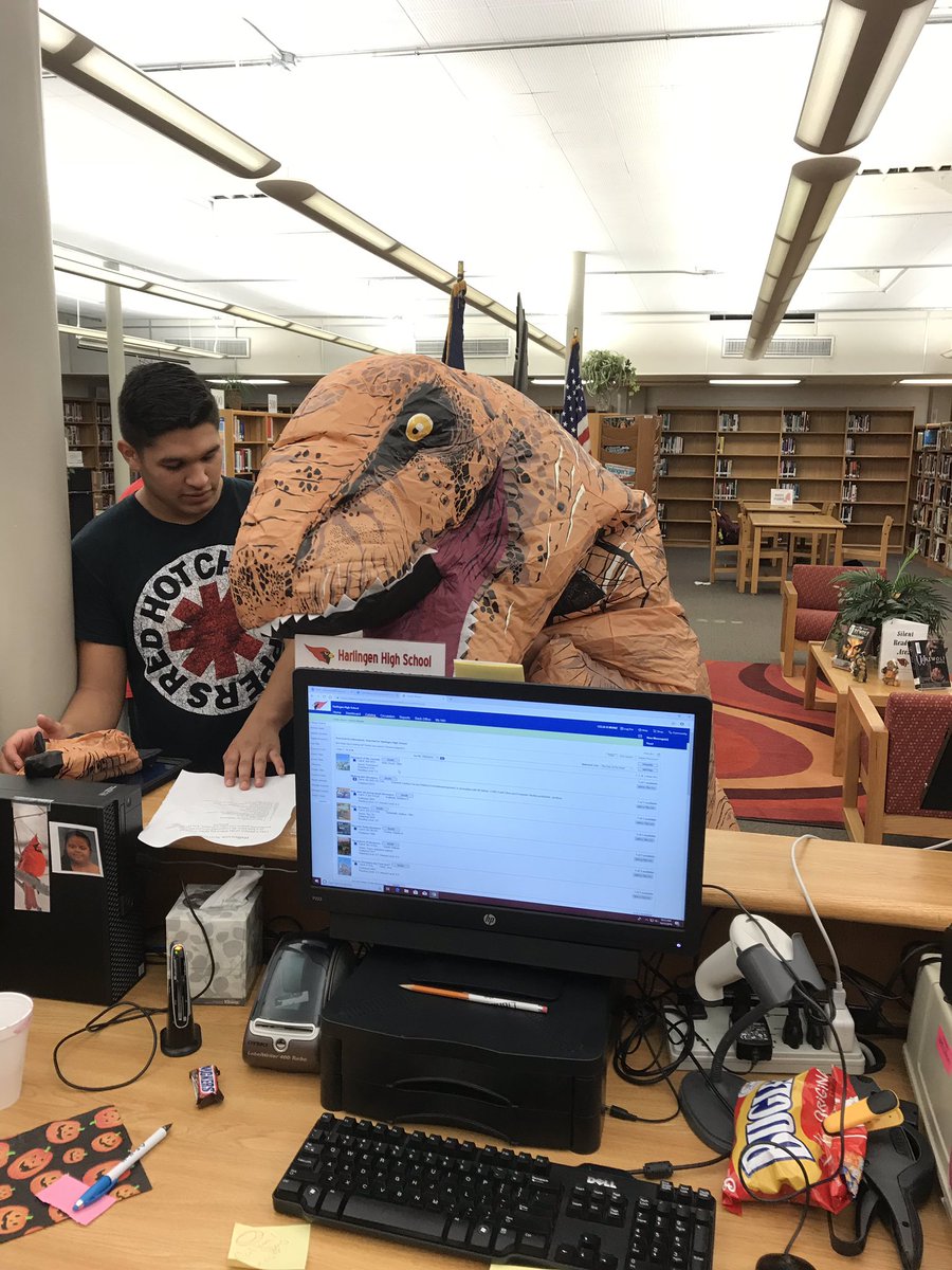 <a href="/HarlingenStuCo/">HHS Student Council</a> @HCISDLibraries <a href="/HHSILC/">HHSILC</a> <a href="/HarlingenHS/">HHS Cardinals</a> <a href="/CamilleGarza20/">Camille Garza</a> Look who’s checking out a book at the HHS ILC. Happy Halloween! #staffhhs18 #ILCuattheLibrary #HCISDProud