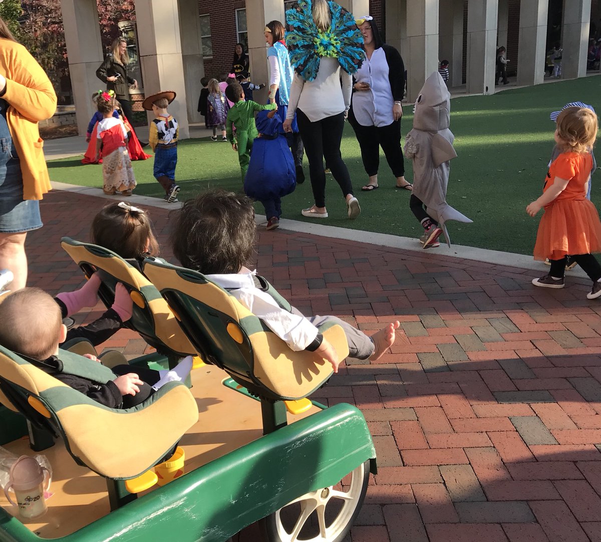 Babies in the courtyard watching the costume parade #mvlittles #mvcommunity