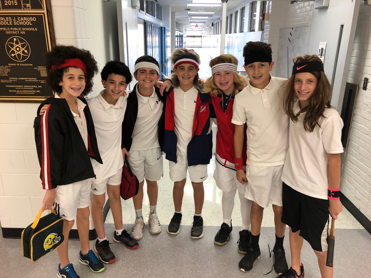 spiesey's tweet photo. Awwwww-loved seeing my students being creative and dressing as my childhood tennis idols for #Halloween2018 @JimmyConnors @johnmcenroe @andreagassi @bjornborg Should have brought my Wilson T2000 for them! @SraFberg #carusoway @109Caruso #scoregal https://t.co/vnpyu3cjaZ