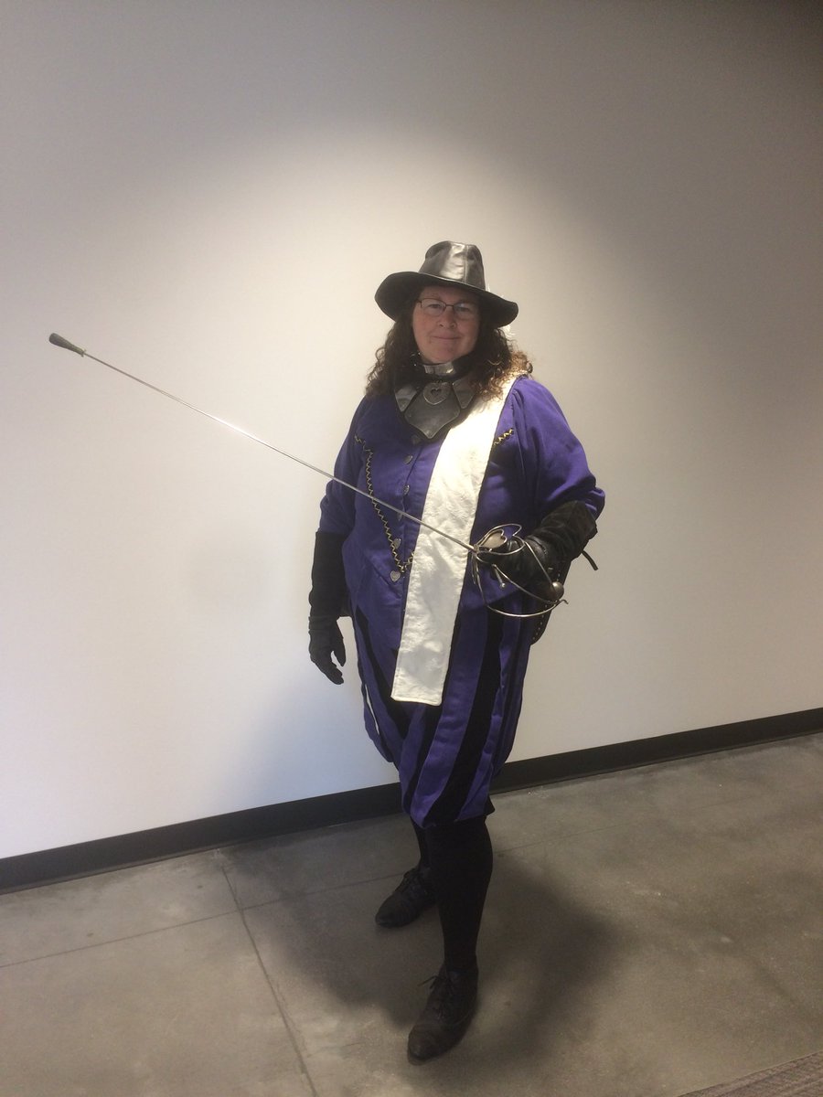 KyneWynn's tweet photo. Wherein our heroine dressed up for her company Halloween party. There’s something you don’t know. #entratasoftware #ThePrincessBride #TheThreeMusketeers #KyneWynntheKind #hearts #swepthiltsndquillons #yesitissrealsword https://t.co/dClYjKmWK8