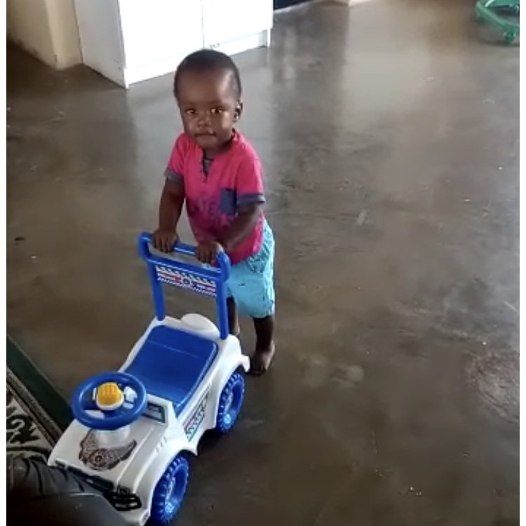 KudaVana's tweet photo. We were worried that this sweet boy would be permanently disabled due to trauma in his past. But he is a fighter, and God is good. He started walking this week with a bit of help from a favorite toy car! #miracleshappen #lovingchildren #zimbabwe #kudavana #kudavanapartnership https://t.co/PxnEkNEQEM