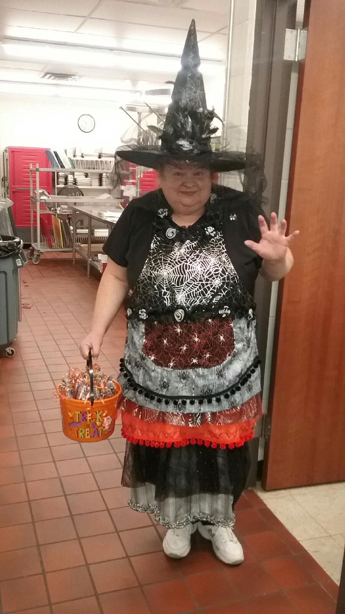 wcsFood's tweet photo. Ms. Carolyn from Scales Elementary sporting her SPOOKY apron she made! @wcsSES Thank you Scales Elementary staff for all you do to feed the kiddos at school. https://t.co/LjQJUoAISS