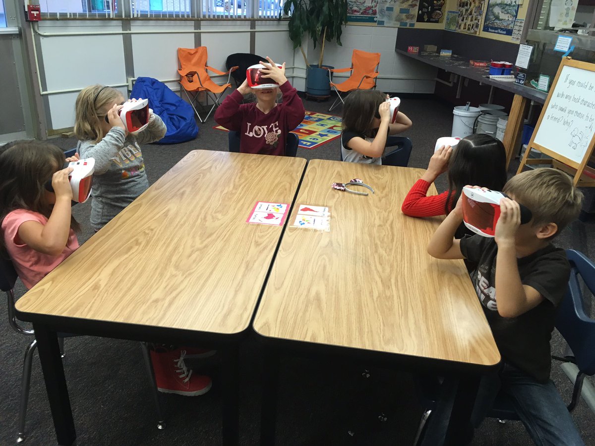 SiftonLibrary's tweet photo. Total engagement! 1st graders explored our solar system using #GoogleExpeditionGoggles observed sun, Milky Way, planets &amp; phases of the moon! Shared knowledge with each other! #siftonsuperstars #epslibraries #epsedtech #lifelonglearners @KristinZiemke https://t.co/Lt1N9B9kGm