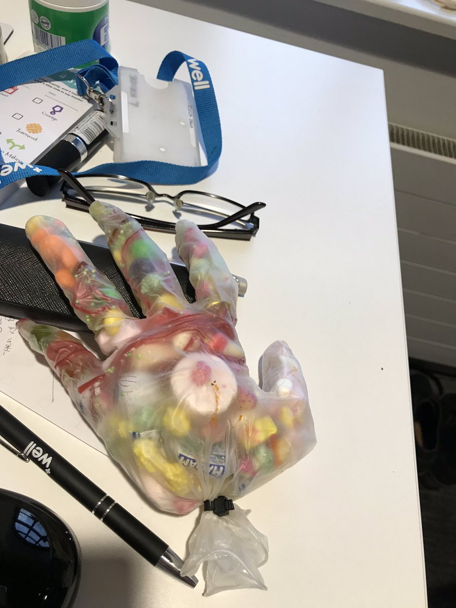 LynnKrige1's tweet photo. Halloween celebration in the office. How amazing are these creepy sweetie filled gloves that were spookily lurking in the office. https://t.co/0behWFp4d9