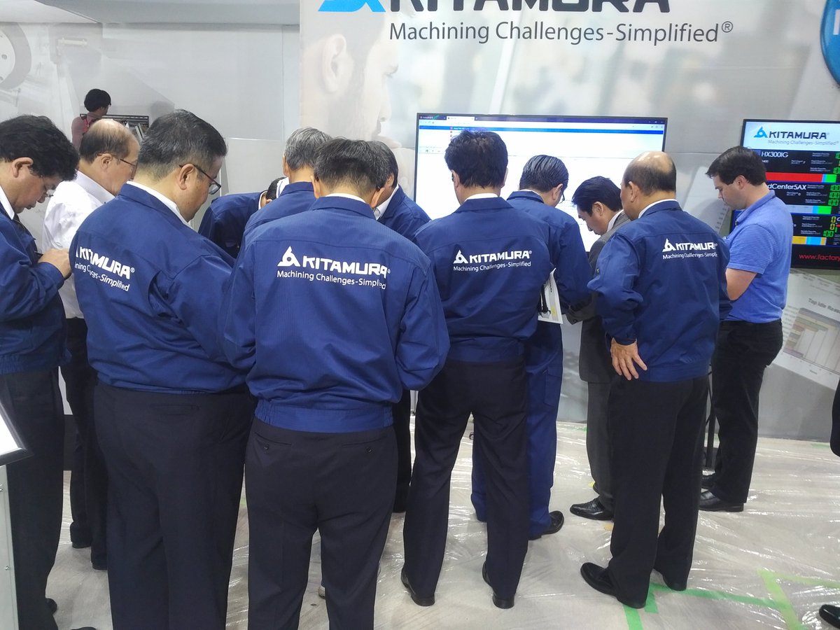 Kitamura-Machinery.com Application Engineers connecting mobile devices to <a href="/FactoryWiz/">FactoryWiz Monitoring</a> Machine Monitoring.   See us at JIMTOF 2018 E-4023