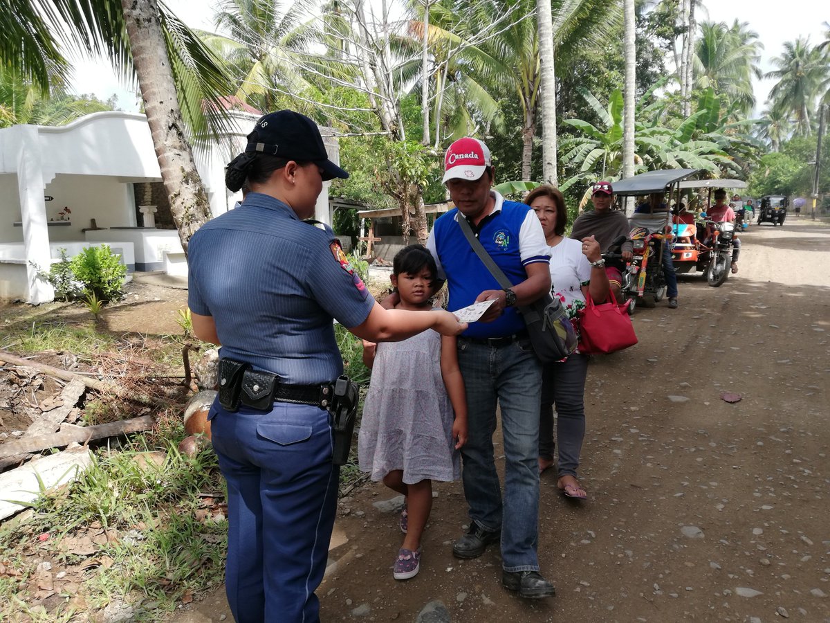 LingigMPS's tweet photo. November 1, 2018

PO2 Fannie B Forones PCR PNCO and PO1 Mary Cris A Delagueron, Asst. OPN PNCO of Lingig Municipal Police Station conducted distribution of leaflets re UNDAS Safety Tips to the populace who paid a visit at Lingig Public Cemetery, Brgy. Sabang, Lingig, SDS. https://t.co/Z3SYzFKJjS