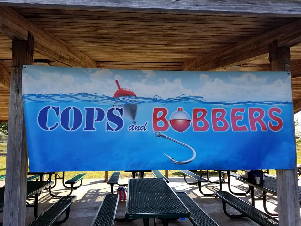 MBPDSC's tweet photo. Kids will be out this morning fishing with officers at the Grand Park lake in Market Common. #communityfirst #buildingrelationships #copsandbobbers https://t.co/u650H4JcNi