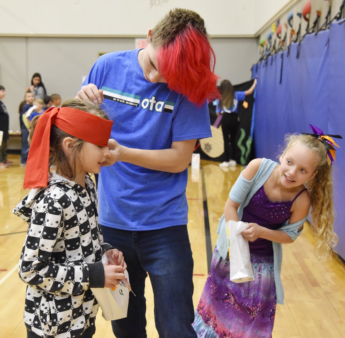 We worked at Regal Elementary to put on our annual Harvest Carnival Halloween Day. Games, crafts, and a few treats...  Logan said it best: "I had more fun than the kids!"