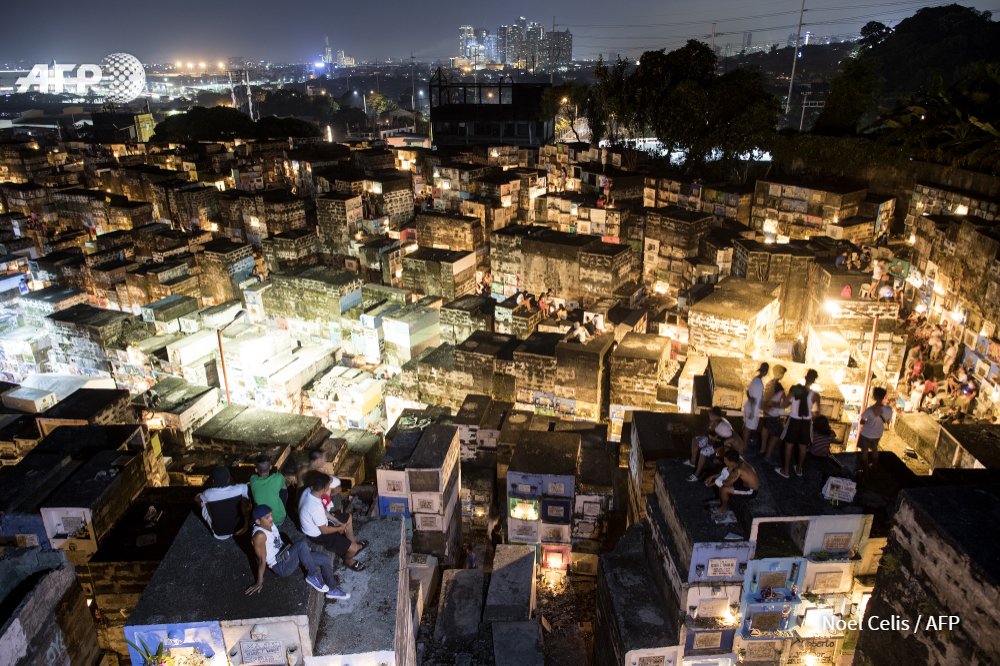 Millions packed cemeteries across the heavily Catholic Philippines on Thursday, for traditional remembrances of the dead that mix somber reflection and the nation's penchant for festivity..