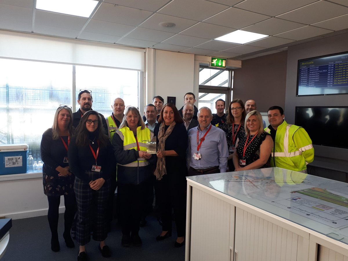 Cardiff_Airport's tweet photo. In case you missed it, we won an award for the best campaign during #UKAirportsSafetyWeek! Here's some of our fab team with the award #proud @AOA_UK https://t.co/dcJbWwt2vV