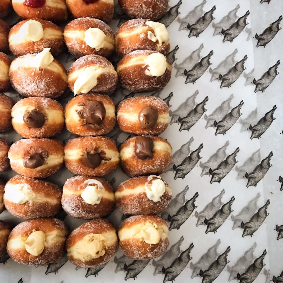 Outside: grey rain
Inside: bountiful doughnuts
Inside doughnuts: abundant custard