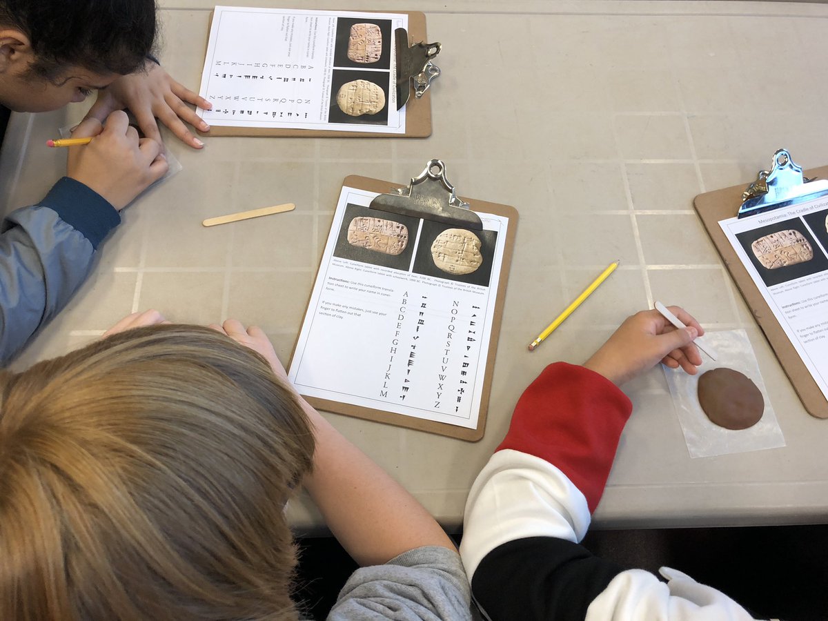 shelagh09's tweet photo. Group 3 @ermalearns is writing in cuneiform.  Harder than it looks! @HeritageSurrey #sd36learn https://t.co/6ogByuxLgd