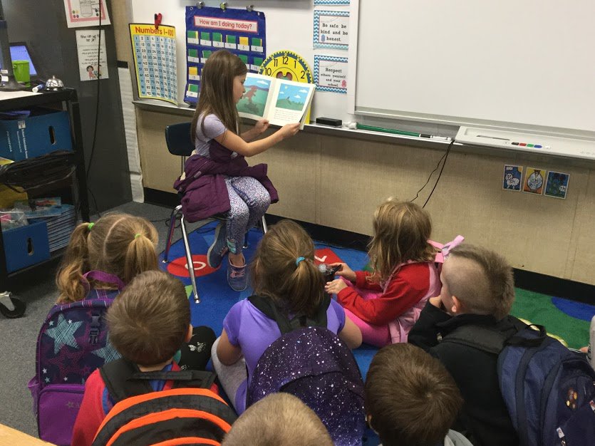 NHWBarry's tweet photo. Today one of my @NHWelemschool Pride Pals came down to read our class a story. She was a student in my classroom last year. It made my teacher heart happy! #funinfirstgrade #makememories https://t.co/hdFlog7tJ2