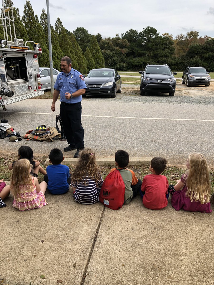 BrittanyEmbler's tweet photo. We had SO much fun learning about Fire Safety from the Cary Fire Department! We got to go inside the tiny house &amp; crawl down the ladder, sit in the fire truck and see all of the gear they wear! Thank you, firefighters! @oakgrovees #wonderwake #dynamiclearningexperiences https://t.co/y7KFjKdBJs