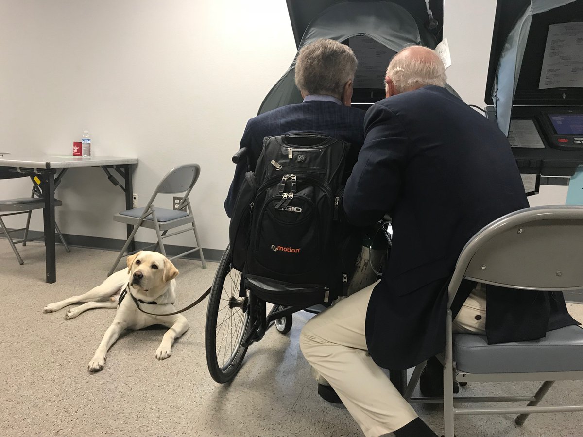 The 41st President accompanied by his two best friends -- Jim Baker and Sully -- discharging his civic duty and voting today.