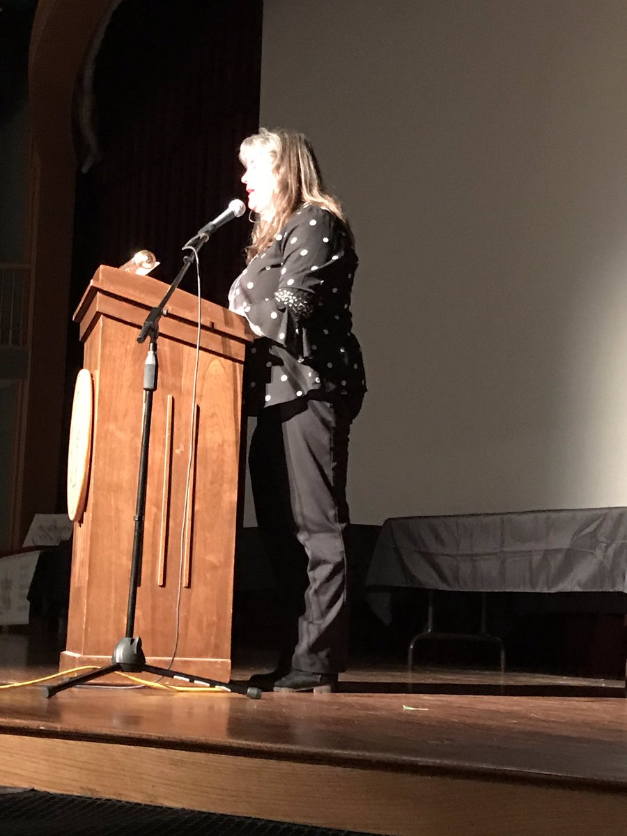 Sherry Bueso brings greetings to students and families attending the Life After Middle School program at FCC