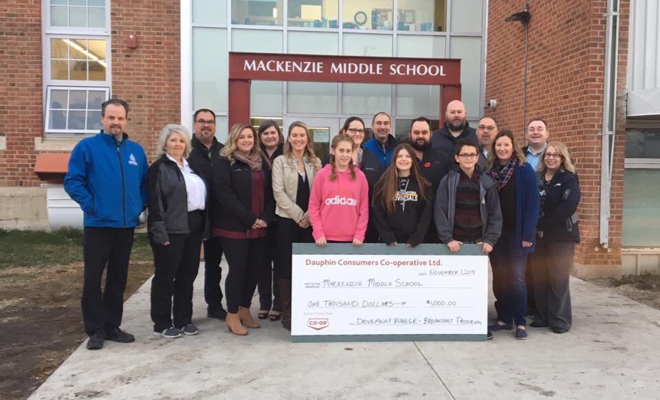 Today we had the pleasure of presenting Mackenzie Middle School with $1000 donation for their Breakfast Program. A huge thank you to the <a href="/FCCagriculture/">Farm Credit Canada</a> crew MMS teachers &amp; students that volunteered for the Fundraising BBQ &amp; also a big Thank You to <a href="/dauphinkings/">Dauphin Kings</a> for bagging groc.