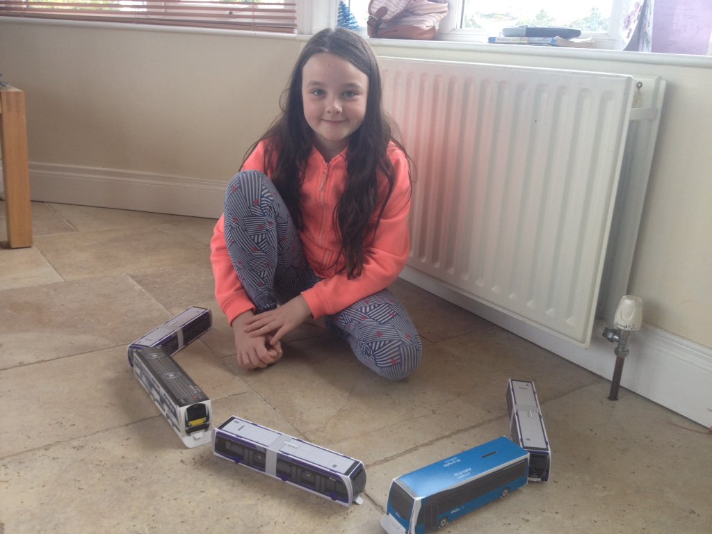 FionnualaO1's tweet photo. Thank you @Translink_NI for my model trains and buses #gliderbelfast #futuretraindriver #uup18-exhibitor https://t.co/aMUuC6Cd1R