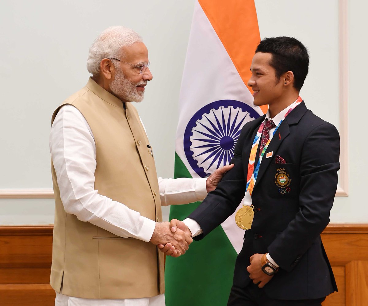 narendramodi's tweet photo. Meet my young friend Jeremy Lalrinnunga. 

The youngster from Mizoram bagged a Gold medal at the 2018 Youth Olympic Games by lifting a total of 274 kg, which was only one kilogram short of the Seniors National records! 

Many congratulations, Jeremy! https://t.co/ZXV77rxEfc