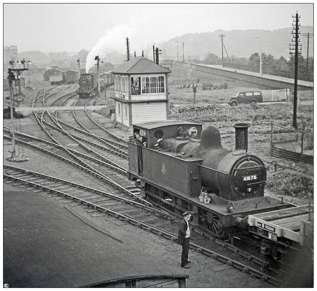 41878 at Shobnall Junction (PJS 0585)

Burton-upon Trent had many miles of railway track, some brewery owned and some, like this shown in Peter's picture of 31/08/1957, British Railways owned. In this busy scene 41878 is shunting and in the background by the signal box