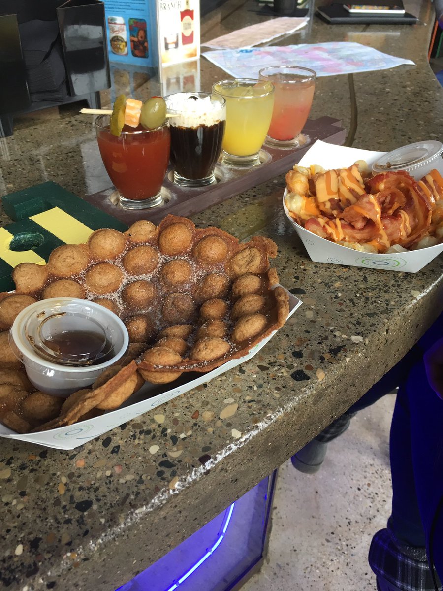 TheoryTraveling's tweet photo. Waffles and Tokens with the famous cocktail flight with @thegridoldtown! #oldtown #downtownlansing #puremichigan #thegrid https://t.co/GKvPh2fTqM