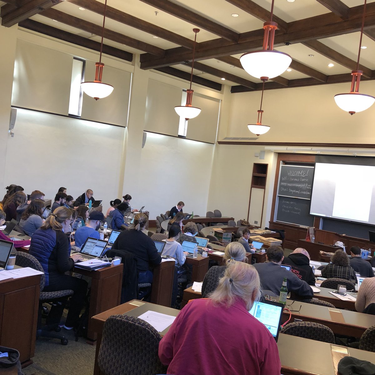 MassBailFund's tweet photo. About 50 amazing volunteers hard at work entering in 2500 CourtWatch forms from 6 months of CourtWatching!! #wadadam #dadifference https://t.co/oyJEzWrRHl