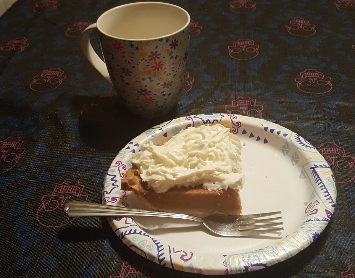 Sunday night snack...pumpkin pie and a coffee mug of hot Sake.