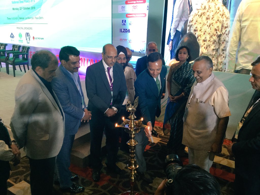 JindalSteel_In's tweet photo. Our Chairman @MPNaveenJindal , along with honorable Union Minister of Steel @chbirendersingh Ji and other dignitaries, lighting the lamp at the All India Induction Furnace Association #AIIFA's 32nd International Conference at Delhi. https://t.co/4M1wTV0tKl