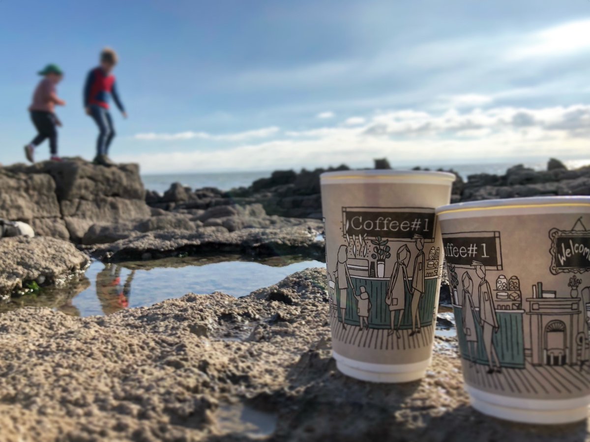 SurroundingsUK's tweet photo. @coffeenumber1 americanos and hot chocs, served in their new biodegradable cups featuring my design, in the warm sun, at the seaside, in October.  Now that makes me happy. #coffeenumber1 #newcups #richedwardsart https://t.co/9iex8TvcIy