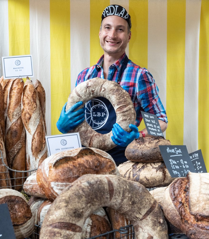 Only someone who *knows* their bread is absolutely delicious smiles like this! We are super stoked to have @lbpedlar at #CanopyMarket and we are particularly lucky as this is their only weekend outpost beyond the bakery!