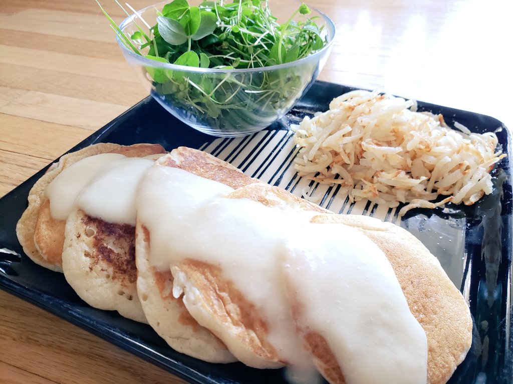 EverydayTasty's tweet photo. Piña colada #pancakes covered in piña colada syrup, hashbrowns, and microgreens. #vegan #breakfast https://t.co/YuShi4ErQ4