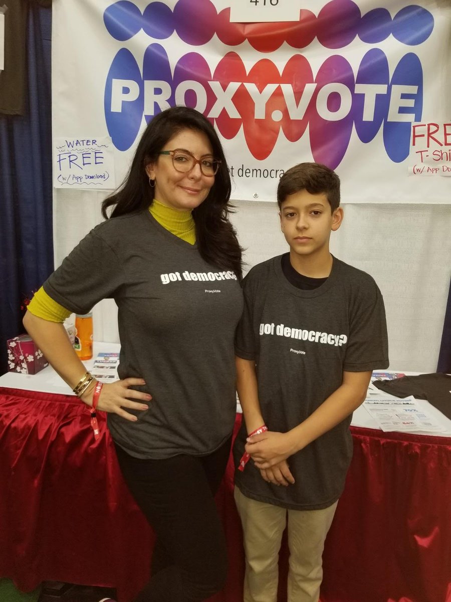 proxyvoteusa's tweet photo. One of the aspects we loved about Politicon LA was the meaningful conversations we had with many of you. You downloaded our app, put on our t-shirt and got on board in general. You understand that it was up to you. Mother and son, son listening as intently as mother! Start young! https://t.co/385dOUesVd