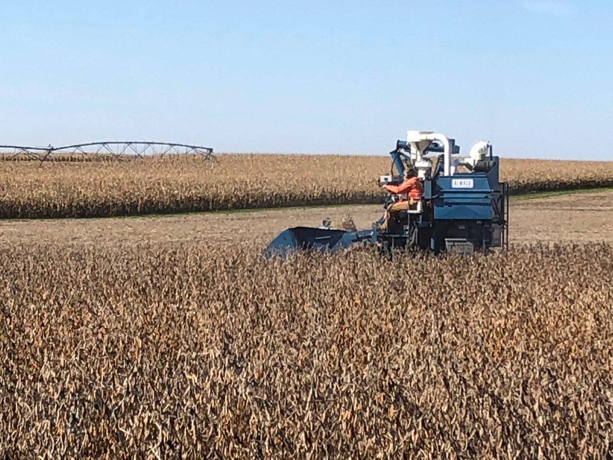 Busy day at the research farm yesterday. We harvested beans and took 4 foot soil samples in the water quality plots. At the same time researchers were at the farm combining as well.