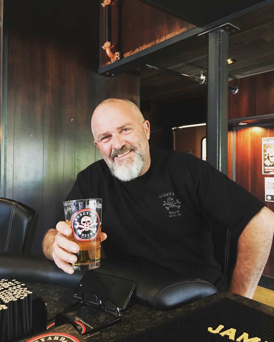 BoneyardBeer's tweet photo. This is Bret. Bret celebrated 101 consecutive days at #boneyardpub last Friday. He has sat in the same barstool everyday since opening day. His favorite beer? PABO Pilsner or Camper Van Kolsch. Cheers to you, Bret! Our regulars rock! #boneyardbeer #letitbeknown #regularsrule https://t.co/TxGrlP5ACC