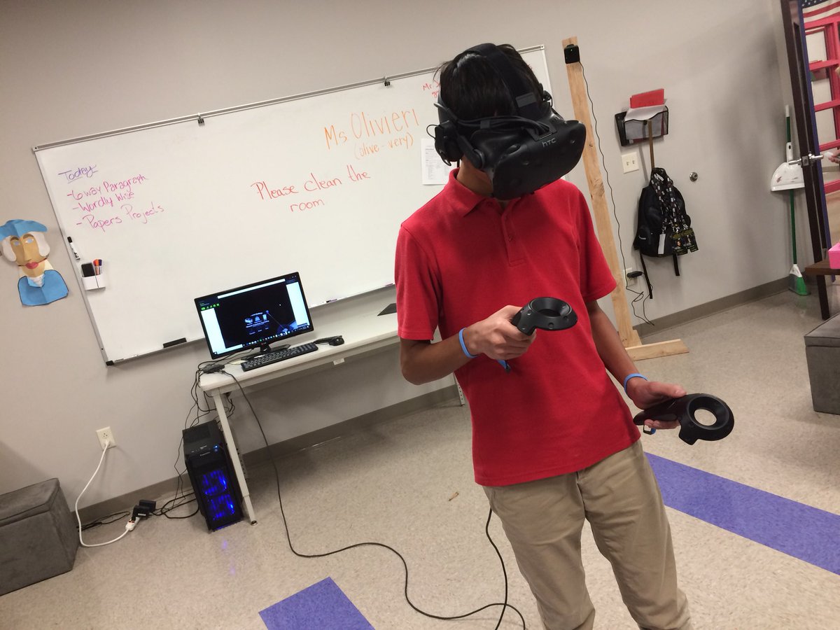 ideasforteacher's tweet photo. Student using the @htcvive in our #PBL classroom. He is building a project to represent the Roman Catholic Church. #studentgoals #FlippedLearning #TuesdayMotivation #flippedpbl #VRclassroom https://t.co/S0OmL7doWh