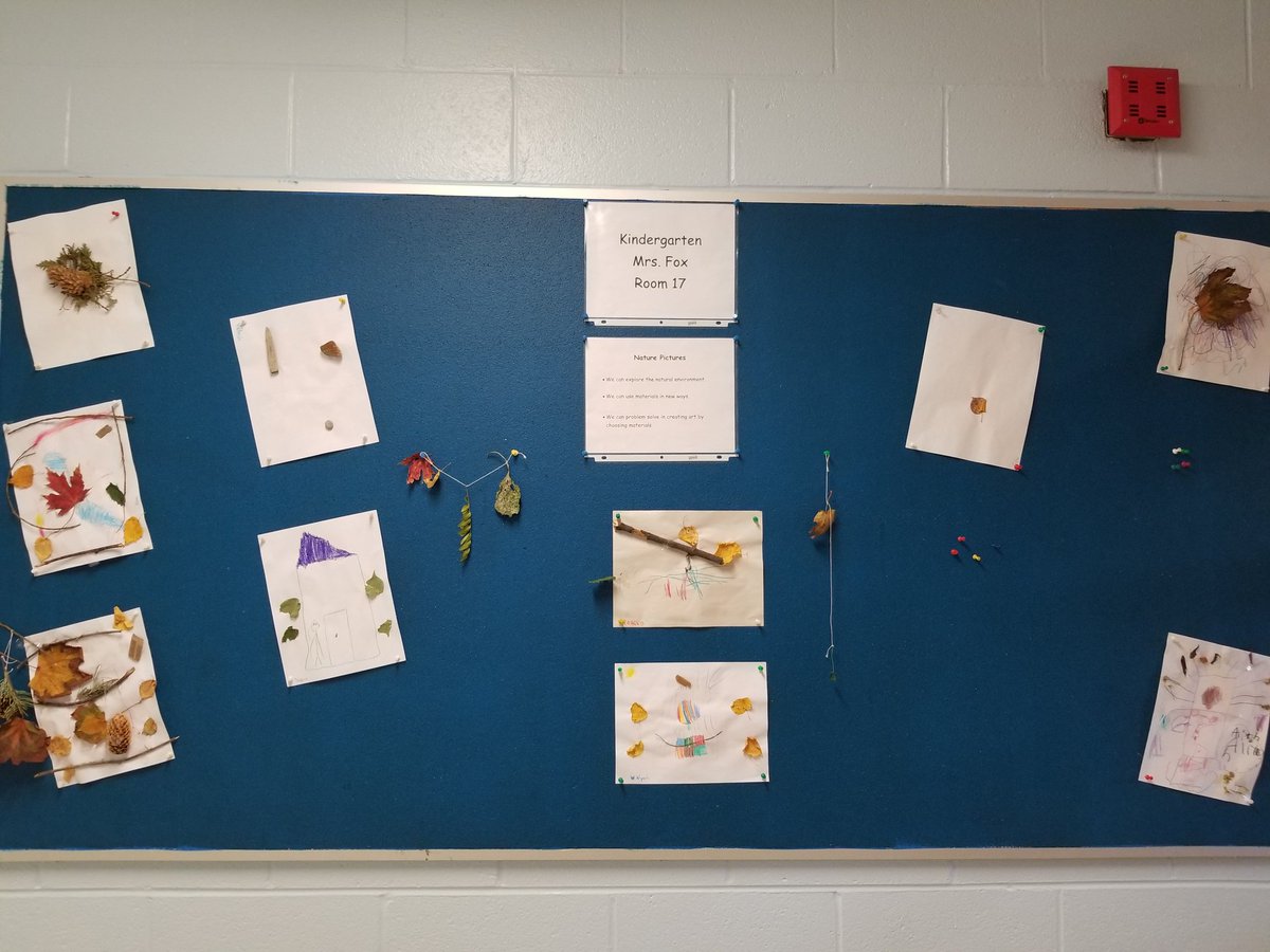 Ms Fox's Kindies exploring their outdoor environment and creating art from what they have found