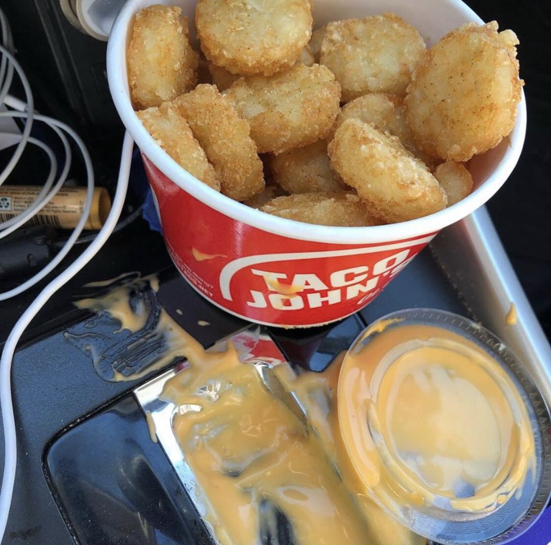 defay_defay's tweet photo. @tacobell Finally found out why there is a trench in the stick shift column. #nachocheese #TacoTuesday https://t.co/og2wC1lfq8