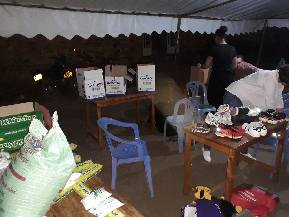 welly_raglan's tweet photo. Productive evening with @Welly_Orange separating 350kg of generous donations for primary &amp; secondary schools, sponsored children, home visits and a Children's rehab centre. Students followed by preparing lessons to teach at Nabukenya Primary School after a visit to a coffee farm. https://t.co/DSvCaMvIvh