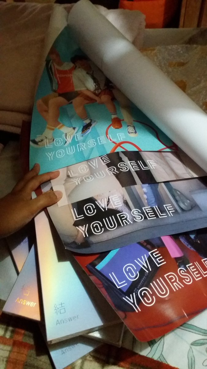 iceee_jk's tweet photo. My new babies are finally hereeee! 
My Love Yourself Trilogy is complete im crying 😭😭 Thank you @ARCollection7 also for the complete set of posters I did not expect to have them all. Also for the two cute pictures of RM and Jin. 
Till next time 😘😘😘 https://t.co/w3AmbPyxUi