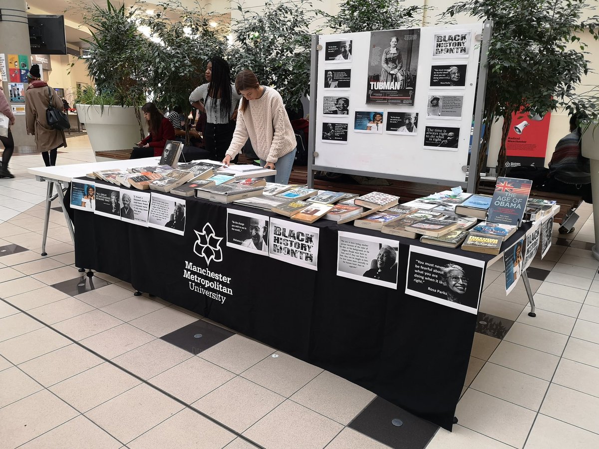 JessStoddard's tweet image. Students and staff from #ManMet's history department setting up a stand, showcasing some of the books available in @MMULibrary for #BlackHistoryMonth They are also showing #TheBlackPanther this afternoon, followed by a panel about the representation of race in the film 🎥