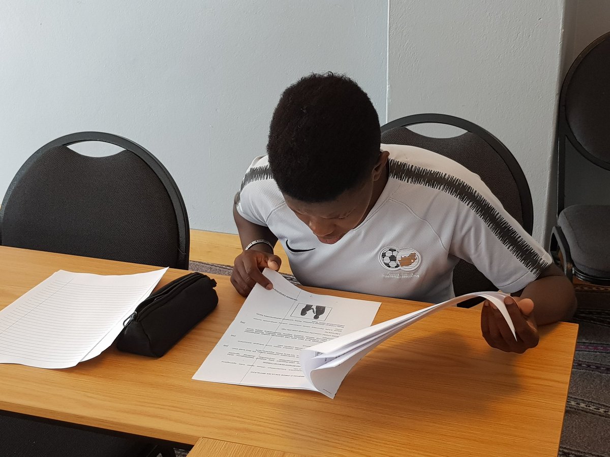 SAFA_net's tweet image. Bantwana captain Sibulele Holweni and Karabo Dlamini writing their Zulu exam this morning with Invigilator Palmer @Banyana_Banyana