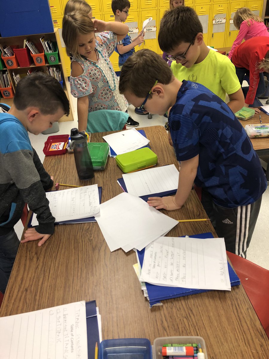 Second graders doing a gallery walk to read the non-fiction ”craft moves” of their peers. <a href="/FESfalcons/">Florence Elementary</a> #KellerLiteracy #writersworkshop
